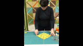 Easy Quilt from a Layer Cake from quiltfabriccom called Chris Cross [upl. by Hadias]