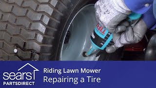 How to Repair a Riding Lawn Mower Tire [upl. by Etirugram]