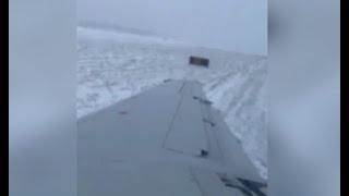 Dramatic video shows plane slide off runway at Chicagos OHare Airport due to icy conditions [upl. by Goldfarb]